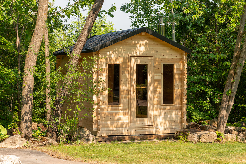 LeisureCraft Georgian cabin sauna front view with glass door and two windows