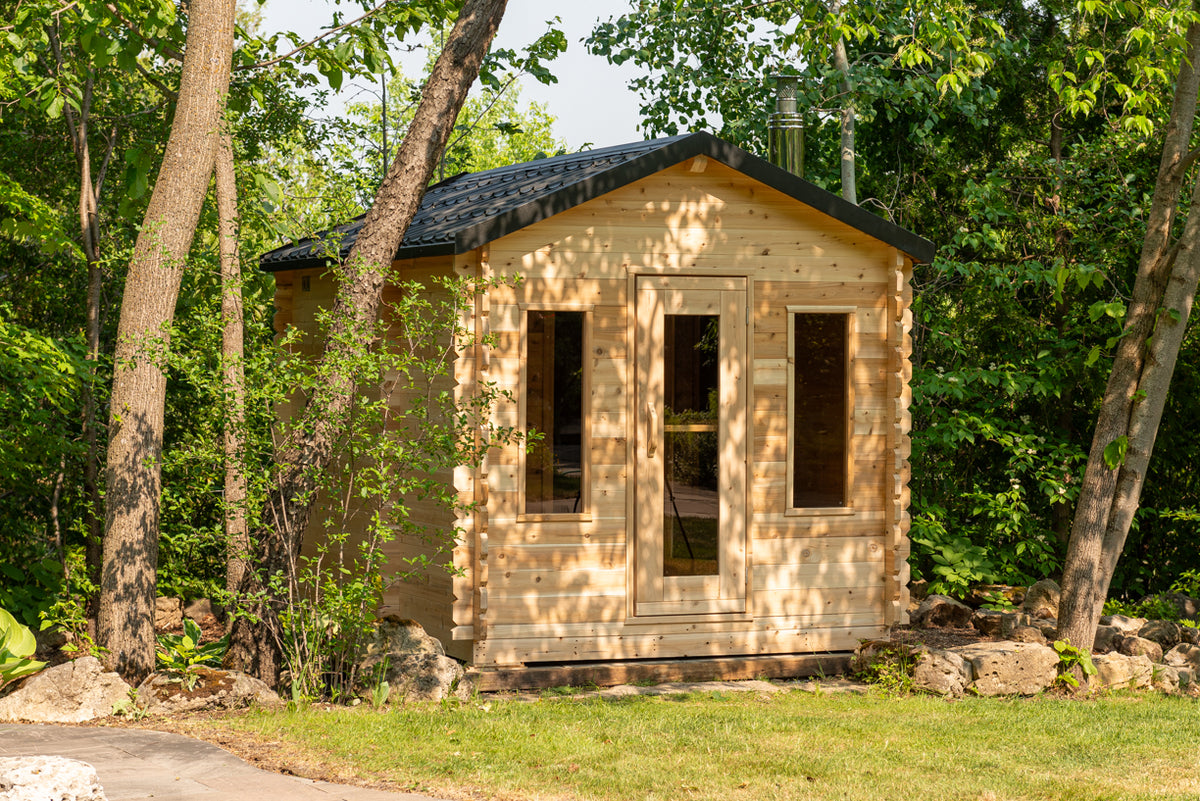 LeisureCraft Georgian cabin sauna front view with glass door and two windows